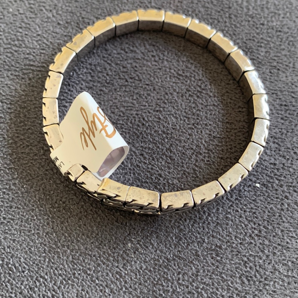 New with tags silver wrap bracelet and earring set